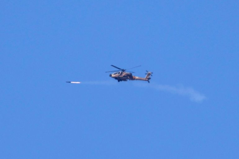 epa11337154 An Israeli Apache helicopter flies over the Gaza Strip, as seen from an undisclosed area on the Israeli side of the border with Gaza, southern Israel, 13 May 2024. More than 35,000 Palestinians and over 1,455 Israelis have been killed, according to the Palestinian Health Ministry and the Israel Defense Forces (IDF), since Hamas militants launched an attack against Israel from the Gaza Strip on 07 October 2023, and the Israeli operations in Gaza and the West Bank which followed it. EPA-EFE/ATEF SAFADI