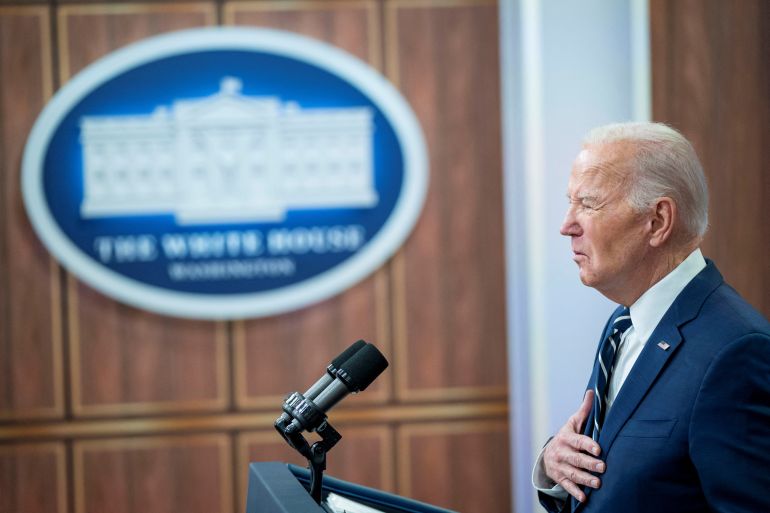 Joe Biden speaking. He is at a lectern. There is a logo of the White House behind.