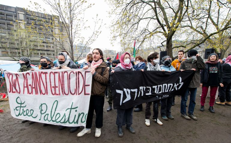 Protesters in support of Palestinians stand at an encampment, during the ongoing conflict between Israel and the Palestinian Islamist group Hamas, at McGill University’s campus in Montreal, Quebec, Canada May 2, 2024. REUTERS/Peter McCabe