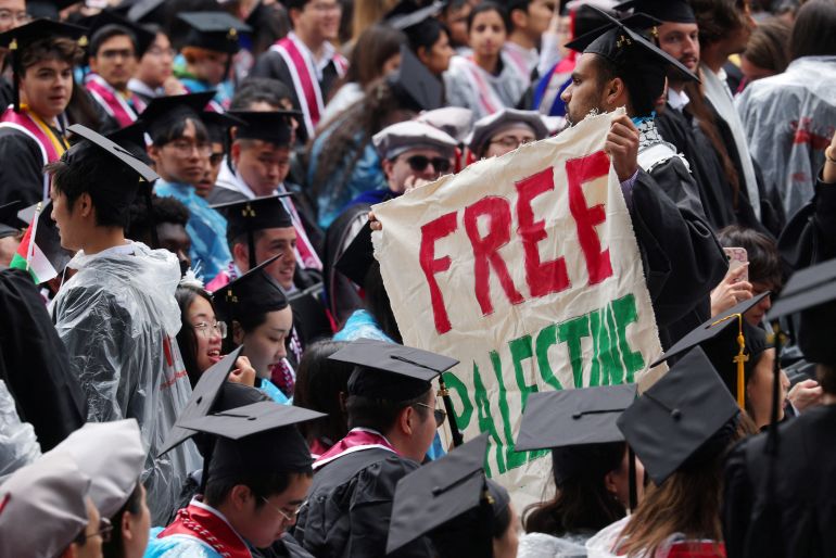 Graduating students stage a pro-Palestinian demonstration and walk out of Commencement ceremonies at the Massachusetts Institute of Technology (MIT), during the ongoing conflict between Israel and the Palestinian Islamist group Hamas, in Cambridge, Massachusetts, U.S., May 30, 2024. REUTERS/Brian Snyder