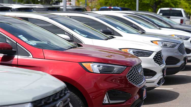 Inflation pressures lingering from pandemic are keeping Fed rate cuts on pause