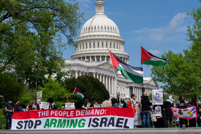 Pro-Palestinian activists demonstrate outside the Capitol in Washington, Saturday, April 20, 2024, as the House prepares to vote on approval of $95 billion in foreign aid for Ukraine, Israel and other U.S. allies. (AP Photo/J. Scott Applewhite)